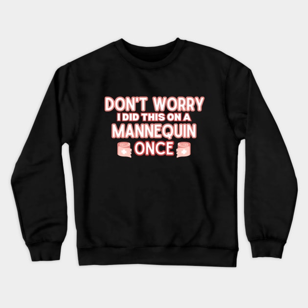 Funny Sarcastic Nursing Humor Attire Gift - 'Don't Worry I Did This on A Mannequin Once' - Hilarious Medical Staff Saying Funny Nurse Crewneck Sweatshirt by KAVA-X